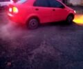 Красный Шевроле Авео, объемом двигателя 1.5 л и пробегом 330 тыс. км за 2950 $, фото 1 на Automoto.ua