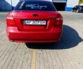 Красный Шевроле Авео, объемом двигателя 1.5 л и пробегом 400 тыс. км за 3500 $, фото 3 на Automoto.ua