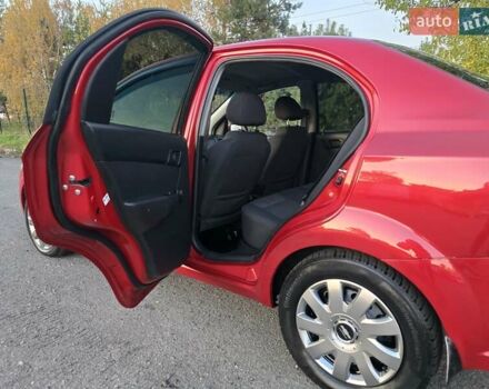 Шевроле Авео 2007 у Хмельницькому на Automoto.ua Червоний Шевроле Авео, об'ємом двигуна 1.5 л та пробігом 180 тис. км за 3299 $, фото 33 на Automoto.ua