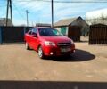 Красный Шевроле Авео, объемом двигателя 1.6 л и пробегом 255 тыс. км за 3300 $, фото 1 на Automoto.ua