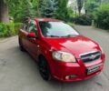 Красный Шевроле Авео, объемом двигателя 1.5 л и пробегом 205 тыс. км за 3990 $, фото 2 на Automoto.ua