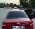 Красный Шевроле Авео, объемом двигателя 1.5 л и пробегом 200 тыс. км за 3800 $, фото 1 на Automoto.ua