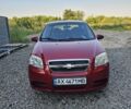 Красный Шевроле Авео, объемом двигателя 1.4 л и пробегом 203 тыс. км за 3702 $, фото 1 на Automoto.ua