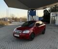 Красный Шевроле Авео, объемом двигателя 1.5 л и пробегом 296 тыс. км за 3950 $, фото 1 на Automoto.ua
