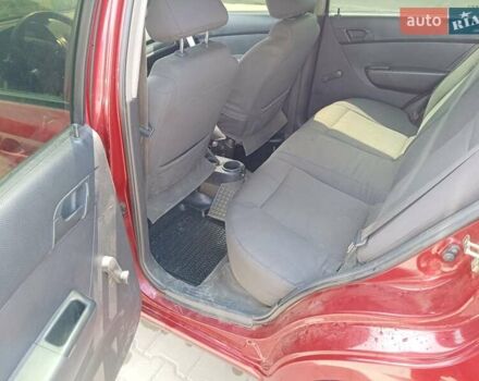 Червоний Шевроле Авео, об'ємом двигуна 1.5 л та пробігом 300 тис. км за 4000 $, фото 3 на Automoto.ua