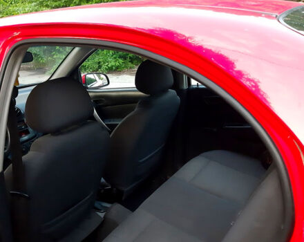 Червоний Шевроле Авео, об'ємом двигуна 1.5 л та пробігом 177 тис. км за 1950 $, фото 6 на Automoto.ua