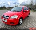 Красный Шевроле Авео, объемом двигателя 1.5 л и пробегом 225 тыс. км за 3300 $, фото 1 на Automoto.ua