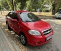 Красный Шевроле Авео, объемом двигателя 1.5 л и пробегом 215 тыс. км за 3800 $, фото 2 на Automoto.ua