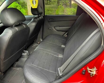 Красный Шевроле Авео, объемом двигателя 1.5 л и пробегом 205 тыс. км за 3140 $, фото 14 на Automoto.ua