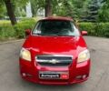 Красный Шевроле Авео, объемом двигателя 1.5 л и пробегом 205 тыс. км за 3990 $, фото 1 на Automoto.ua