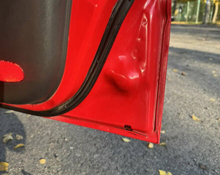 Красный Шевроле Авео, объемом двигателя 1.5 л и пробегом 230 тыс. км за 3750 $, фото 12 на Automoto.ua