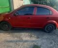Красный Шевроле Авео, объемом двигателя 1.5 л и пробегом 270 тыс. км за 3500 $, фото 2 на Automoto.ua
