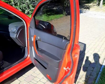 Красный Шевроле Авео, объемом двигателя 1.5 л и пробегом 245 тыс. км за 3650 $, фото 3 на Automoto.ua