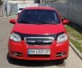 Красный Шевроле Авео, объемом двигателя 1.5 л и пробегом 230 тыс. км за 3800 $, фото 1 на Automoto.ua