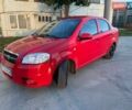Красный Шевроле Авео, объемом двигателя 1.5 л и пробегом 200 тыс. км за 3300 $, фото 1 на Automoto.ua