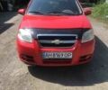 Красный Шевроле Авео, объемом двигателя 1.5 л и пробегом 180 тыс. км за 3800 $, фото 1 на Automoto.ua