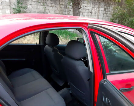 Червоний Шевроле Авео, об'ємом двигуна 1.5 л та пробігом 177 тис. км за 1950 $, фото 8 на Automoto.ua