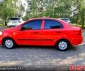 Красный Шевроле Авео, объемом двигателя 1.5 л и пробегом 245 тыс. км за 3650 $, фото 1 на Automoto.ua