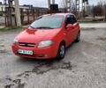 Красный Шевроле Авео, объемом двигателя 1.5 л и пробегом 220 тыс. км за 3600 $, фото 1 на Automoto.ua