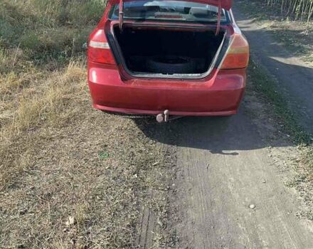 Червоний Шевроле Авео, об'ємом двигуна 1.5 л та пробігом 294 тис. км за 2800 $, фото 14 на Automoto.ua