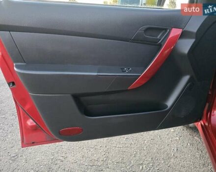 Шевроле Авео 2007 у Хмельницькому на Automoto.ua Червоний Шевроле Авео, об'ємом двигуна 1.5 л та пробігом 180 тис. км за 3299 $, фото 12 на Automoto.ua