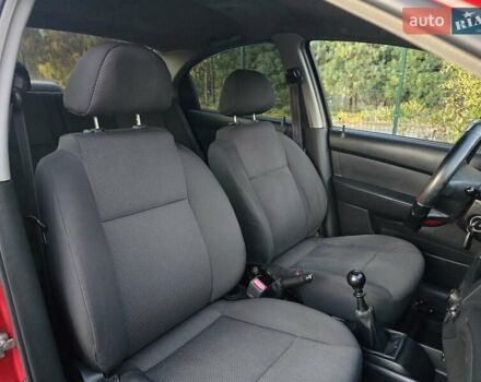 Шевроле Авео 2007 у Хмельницькому на Automoto.ua Червоний Шевроле Авео, об'ємом двигуна 1.5 л та пробігом 180 тис. км за 3299 $, фото 27 на Automoto.ua