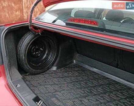 Червоний Шевроле Авео, об'ємом двигуна 1.5 л та пробігом 215 тис. км за 3800 $, фото 16 на Automoto.ua