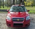 Красный Шевроле Авео, объемом двигателя 1.5 л и пробегом 252 тыс. км за 3900 $, фото 1 на Automoto.ua