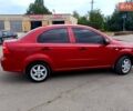 Красный Шевроле Авео, объемом двигателя 1.5 л и пробегом 307 тыс. км за 3800 $, фото 1 на Automoto.ua