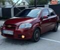 Красный Шевроле Авео, объемом двигателя 1.6 л и пробегом 241 тыс. км за 4550 $, фото 1 на Automoto.ua