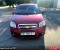 Красный Шевроле Авео, объемом двигателя 1.6 л и пробегом 250 тыс. км за 3500 $, фото 1 на Automoto.ua