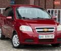 Красный Шевроле Авео, объемом двигателя 1.6 л и пробегом 246 тыс. км за 3950 $, фото 1 на Automoto.ua