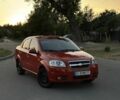 Красный Шевроле Авео, объемом двигателя 1.5 л и пробегом 235 тыс. км за 3309 $, фото 1 на Automoto.ua