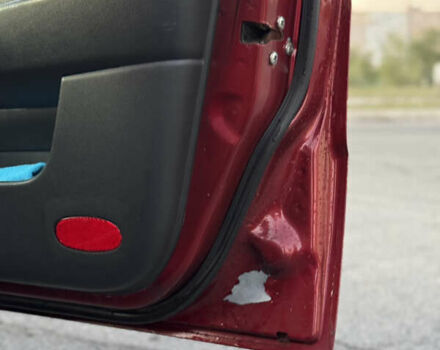 Червоний Шевроле Авео, об'ємом двигуна 1.5 л та пробігом 213 тис. км за 2600 $, фото 18 на Automoto.ua