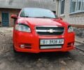 Красный Шевроле Авео, объемом двигателя 1.5 л и пробегом 200 тыс. км за 3598 $, фото 1 на Automoto.ua