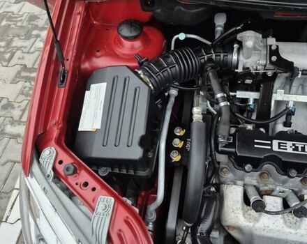 Красный Шевроле Авео, объемом двигателя 1.5 л и пробегом 34 тыс. км за 6200 $, фото 59 на Automoto.ua