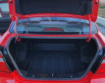 Красный Шевроле Авео, объемом двигателя 1.5 л и пробегом 151 тыс. км за 4900 $, фото 20 на Automoto.ua