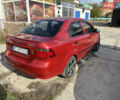 Красный Шевроле Авео, объемом двигателя 1.5 л и пробегом 263 тыс. км за 4500 $, фото 2 на Automoto.ua