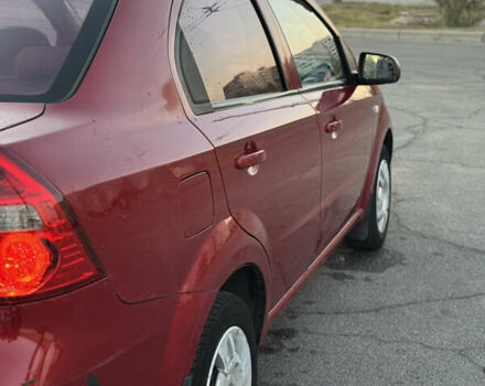 Червоний Шевроле Авео, об'ємом двигуна 1.5 л та пробігом 213 тис. км за 2600 $, фото 14 на Automoto.ua