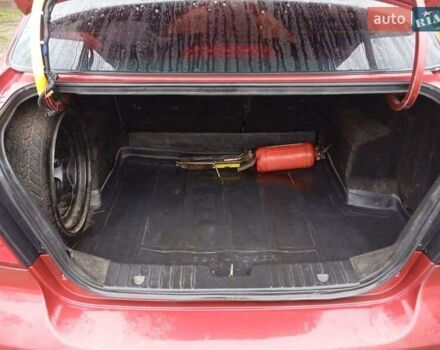 Красный Шевроле Авео, объемом двигателя 1.5 л и пробегом 234 тыс. км за 3200 $, фото 6 на Automoto.ua