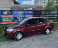 Красный Шевроле Авео, объемом двигателя 1.6 л и пробегом 148 тыс. км за 4500 $, фото 3 на Automoto.ua