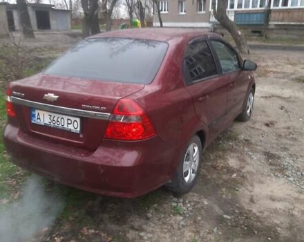 Красный Шевроле Авео, объемом двигателя 1.6 л и пробегом 209 тыс. км за 3500 $, фото 2 на Automoto.ua
