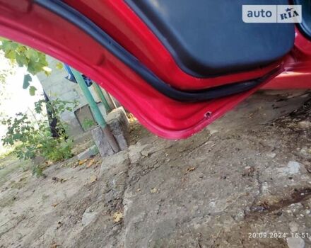Красный Шевроле Авео, объемом двигателя 1.5 л и пробегом 148 тыс. км за 3999 $, фото 92 на Automoto.ua