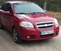Красный Шевроле Авео, объемом двигателя 1.5 л и пробегом 154 тыс. км за 3900 $, фото 1 на Automoto.ua