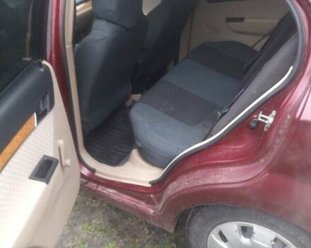 Красный Шевроле Авео, объемом двигателя 1.6 л и пробегом 209 тыс. км за 3500 $, фото 5 на Automoto.ua