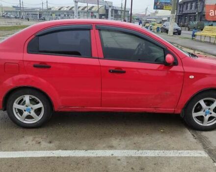 Красный Шевроле Авео, объемом двигателя 1.5 л и пробегом 205 тыс. км за 3300 $, фото 1 на Automoto.ua