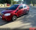 Красный Шевроле Авео, объемом двигателя 1.6 л и пробегом 250 тыс. км за 3500 $, фото 1 на Automoto.ua