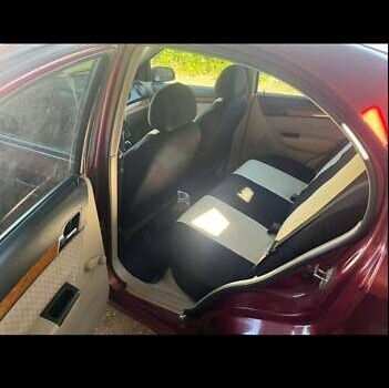 Красный Шевроле Авео, объемом двигателя 1.6 л и пробегом 261 тыс. км за 3600 $, фото 6 на Automoto.ua