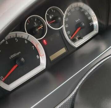 Шевроле Авео 2008 в Харькове на Automoto.ua Красный Шевроле Авео, объемом двигателя 1.5 л и пробегом 158 тыс. км за 4350 $, фото 14 на Automoto.ua