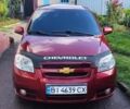 Красный Шевроле Авео, объемом двигателя 1.6 л и пробегом 255 тыс. км за 4500 $, фото 1 на Automoto.ua